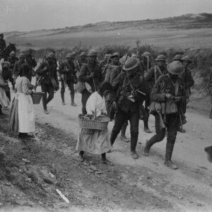 French women selling food and supplies to Canadian troops on their return to camp