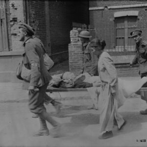 A French woman wounded during a German bombardment behind Cdn lines being taken to dressing station