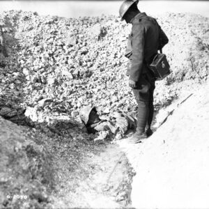 A dead German soldier half buried by shell fire on Hill 70